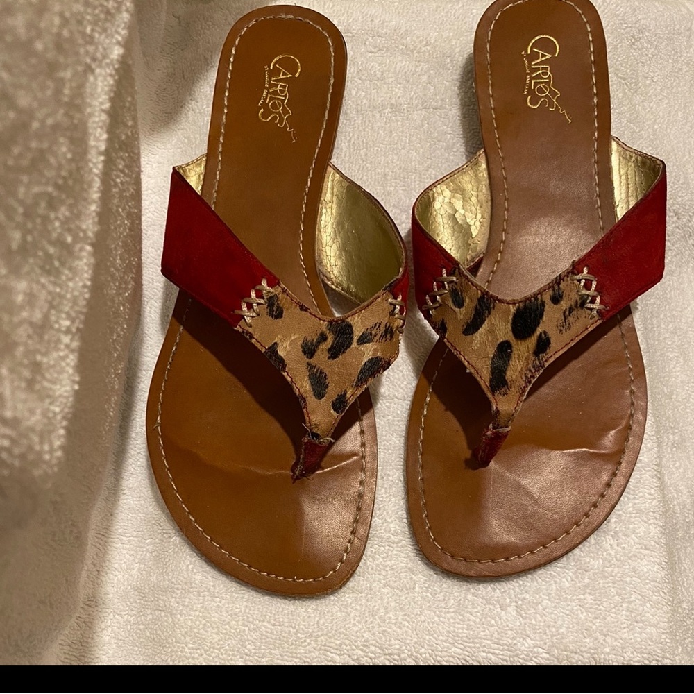 Suede on top leopard with red design great print really comfortable and sexy.